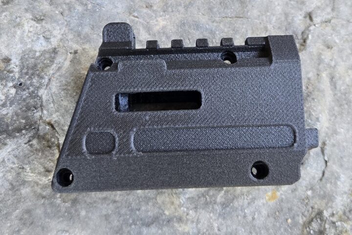Rail Option A mounted on a KelTec SDP, iron sights retained